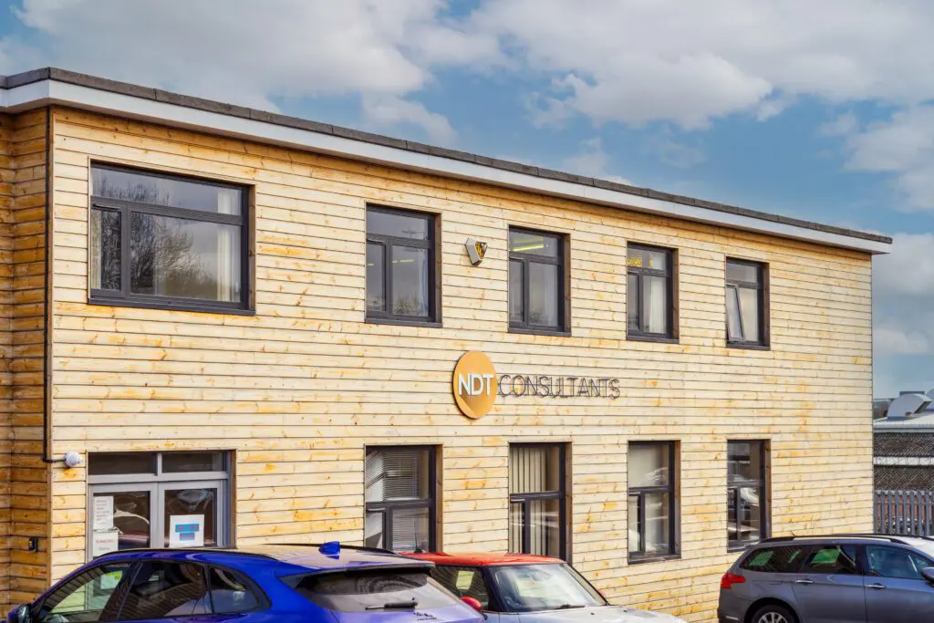 Middlemarch House, the NDT Consultants facility in Coventry, a timber-clad two-storey building carrying the NDT Consultants sign